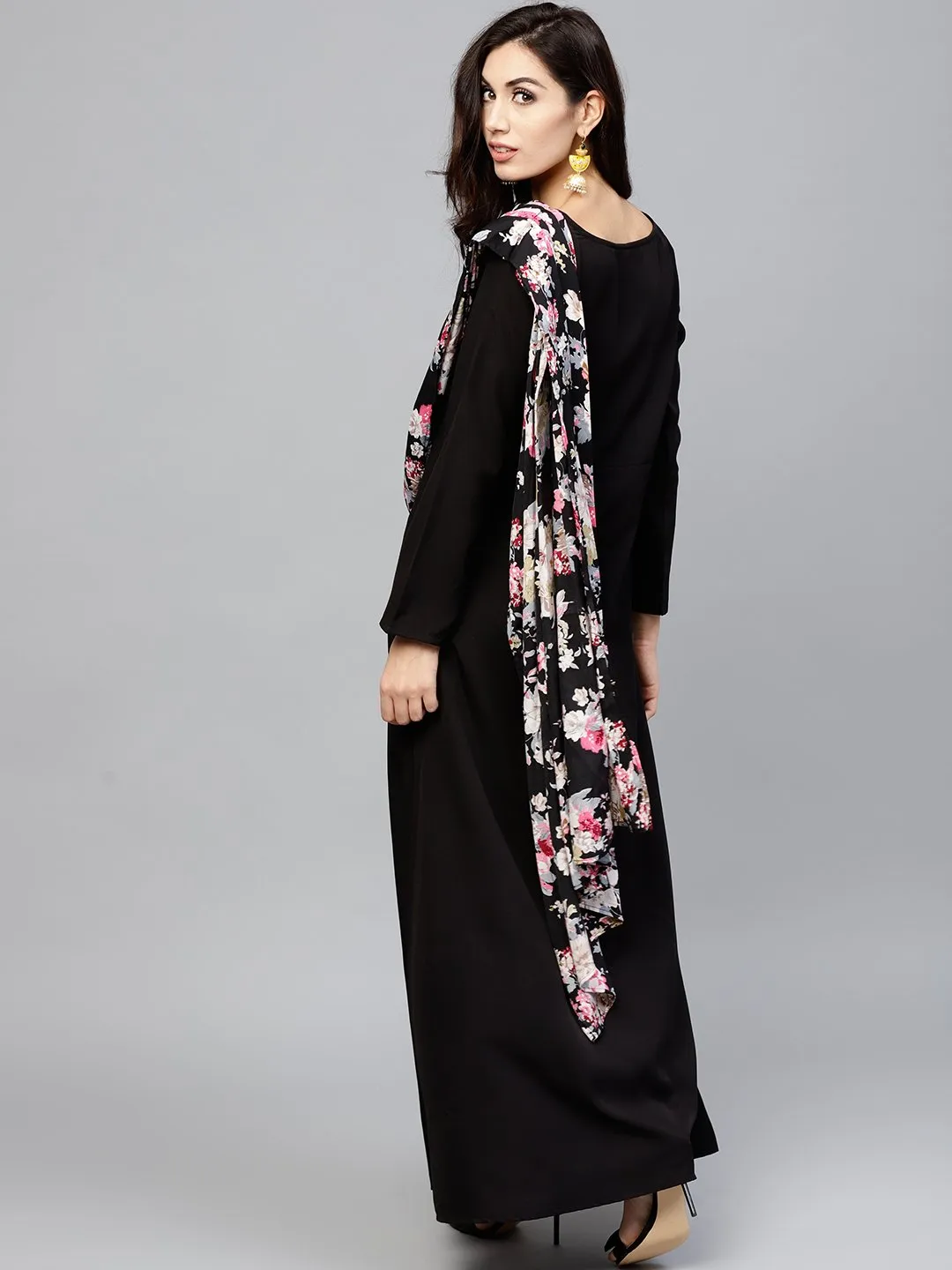 Black printed draped maxi dress with round neck and full sleeves